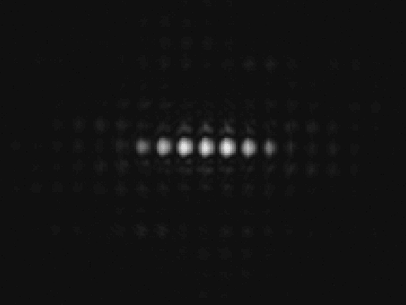 Detail from an image of the same dot shot by the same camera through a T-OLED screen