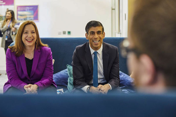 Clare Barclay and Rishi Sunak smiling